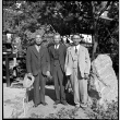 Three men standing in garden (ddr-densho-426-1629)