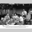 Group eating in backyard of house (ddr-ajah-6-767)