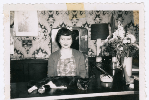 Photo of a woman with a cat (ddr-densho-483-34)