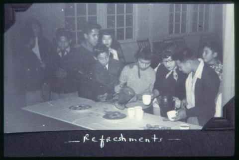 Group of boys around table in Maryknoll (ddr-densho-330-128)