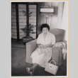 Woman sitting in armchair (ddr-densho-522-67)
