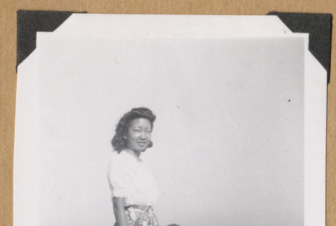Woman standing on a cliff (ddr-densho-542-355)