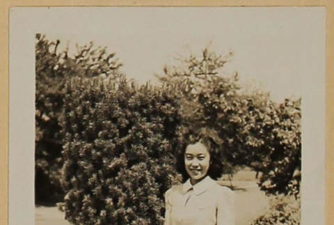 Woman next to bush (ddr-densho-287-613)