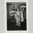 Girl dances with two fans (ddr-densho-37-946)