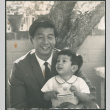 Man holding toddler (ddr-densho-523-405)