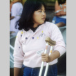 Kellyanne Ebisui holding a crutch (ddr-densho-336-1490)