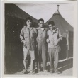 Three soldiers posed outside tents (ddr-densho-201-90)