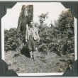 Man in uniform standing by tree (ddr-ajah-2-221)