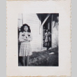 Two women standing outside house (ddr-densho-464-135)