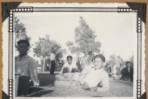 Group sitting on a lawn (ddr-densho-542-136)