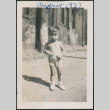 Toddler standing on dirt street (ddr-densho-483-694)