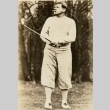 Babe Ruth playing golf and smoking a cigar (ddr-njpa-1-1377)