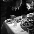 Tomoye (Nozawa) Takahashi at table eating (ddr-densho-426-1698)