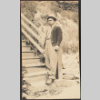 Man on outdoor steps (ddr-densho-278-184)