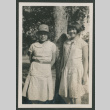 two girls next to tree (ddr-densho-378-454)