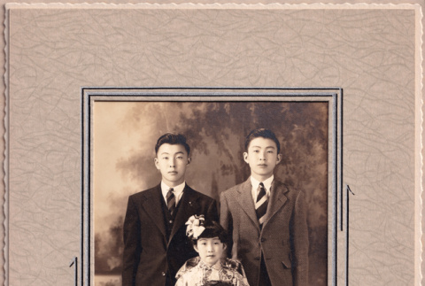 Portrait of two men and girl (ddr-ajah-6-42)