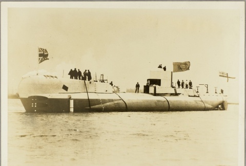 Photo of a British submarine with crew members on deck (ddr-njpa-13-572)