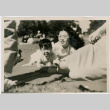 Tomoye and Norman Takahashi at a park (ddr-densho-426-1051)