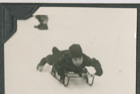 Paul Ohashi sledding (ddr-densho-442-182)
