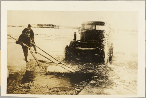 Two Dutch soldiers laboring on a road (ddr-njpa-13-25)