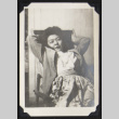 Alcie posing in a chair (ddr-densho-542-687)