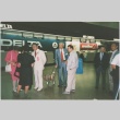 Group at SeaTac Airport on the way to the ceremony for the signing of the Civil Liberties Act of 1988 (ddr-densho-10-202)