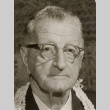 Ernest Shinkaku Hunt wearing leis (ddr-njpa-2-441)