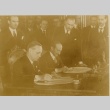 Joachim von Ribbentrop signing Document at a desk (ddr-njpa-1-1470)