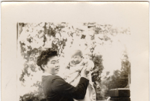Woman holding baby (ddr-densho-426-58)