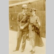 A couple posing in front of a ship (ddr-njpa-1-1482)