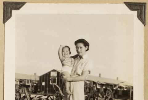 Kunikazue and Alice beside a garden (ddr-densho-542-524)