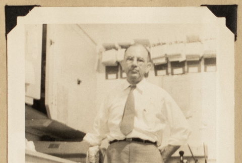 Dr. De Harr at a counter (ddr-densho-542-564)