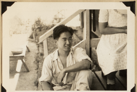 Gary Kikawa on a porch (ddr-densho-542-552)