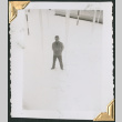 Man standing in snow, photo taken from above (ddr-densho-434-293)