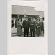 Four people exiting event (ddr-densho-329-803)