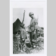 Serviceman and child on Okinawa (ddr-densho-1007-84)