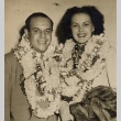 A couple wearing leis (ddr-njpa-1-484)