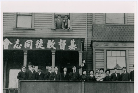 A group gathers on a balcony (ddr-densho-353-75)