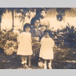 A woman posing with her children (ddr-njpa-4-1139)