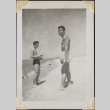 Two men on beach in swim suits (ddr-densho-466-860)