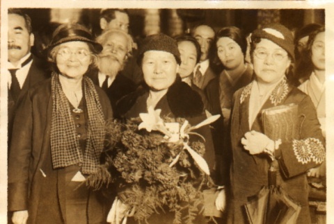 Women posing in a crowd (ddr-njpa-4-320)