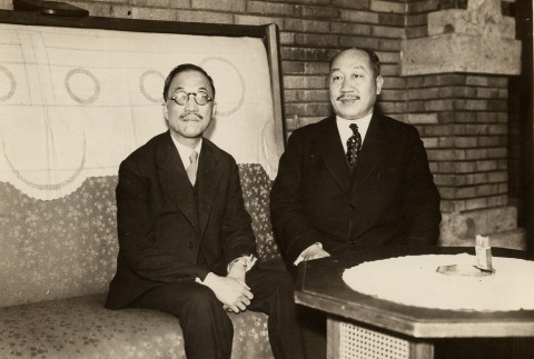Wang Chonghui seated with Ambassador Jiang (ddr-njpa-1-1019)