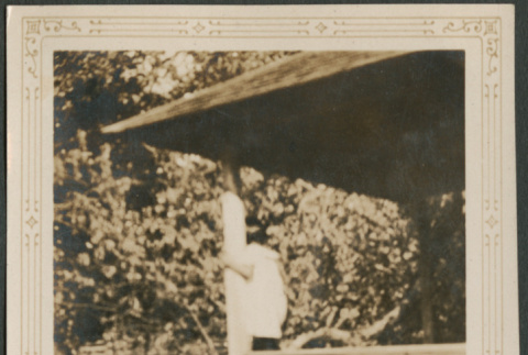 Girl on porch (ddr-densho-316-258)