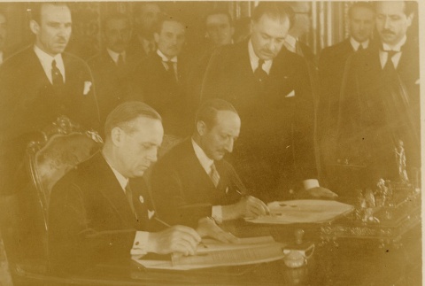 Joachim von Ribbentrop signing Document at a desk (ddr-njpa-1-1470)
