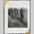 Men in uniform standing in field (ddr-densho-434-68)