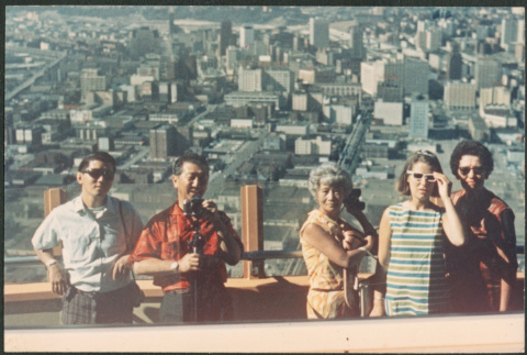 Five people on observation deck of Space Needle (ddr-densho-523-435)