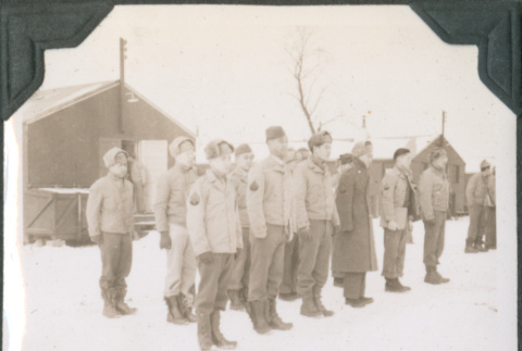 Rows of men standing in snow (ddr-ajah-2-451)