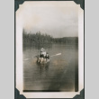 Photo of four people in a row boat (ddr-densho-483-1254)