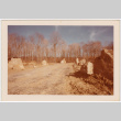Rock pilars lining dirt road (ddr-densho-377-2174)