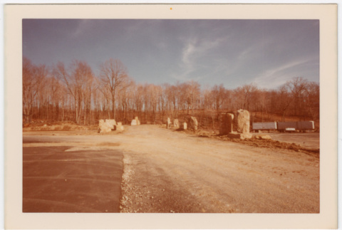 Rock pilars lining dirt road (ddr-densho-377-2176)